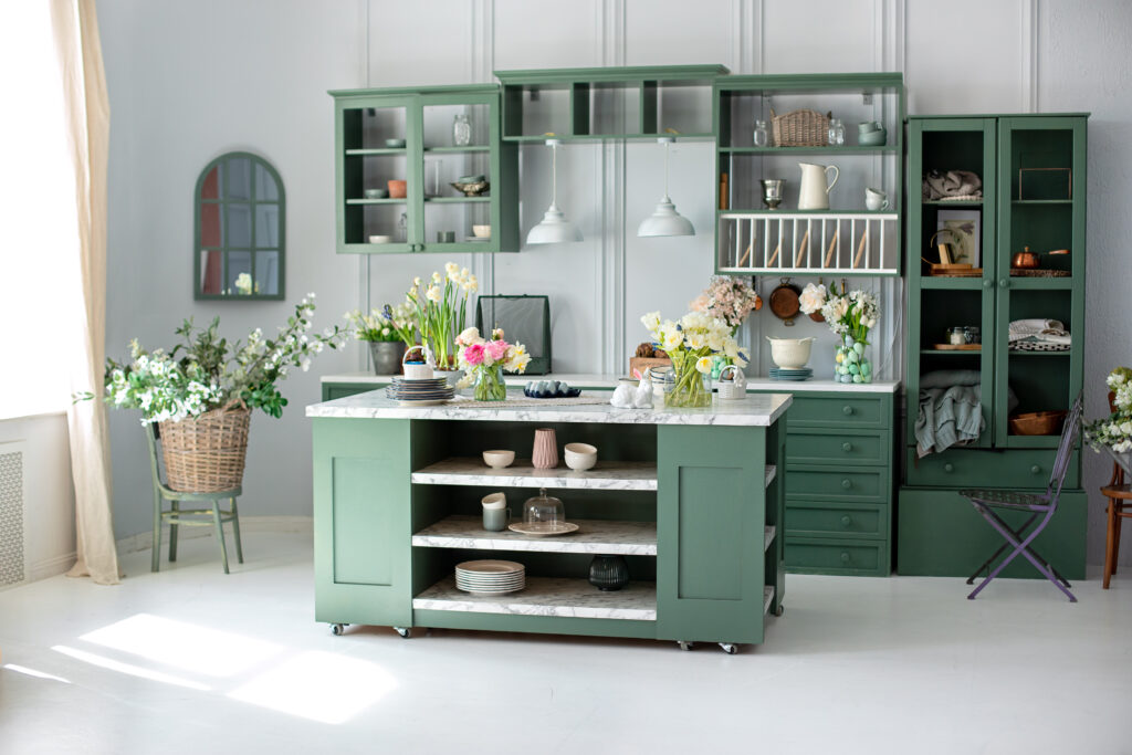 Green,kitchen,interior,with,furniture.,stylish,cuisine,with,flowers,in